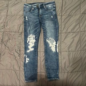 Dark, distressed skinny American Eagle Jeans